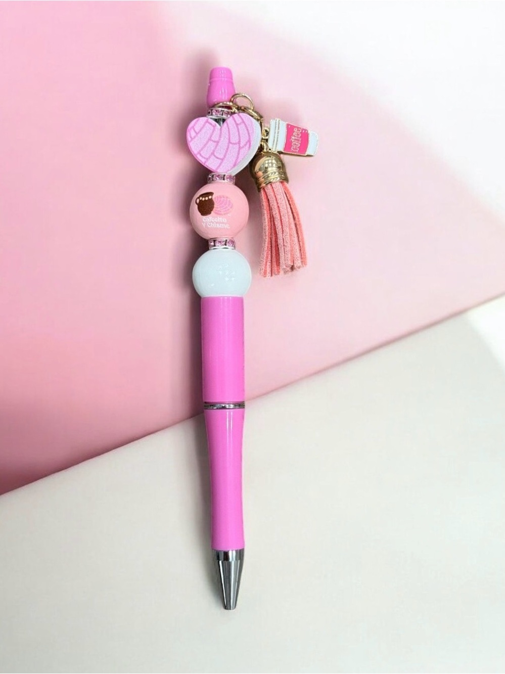 Cafecito y Chisme beaded pen with tassel